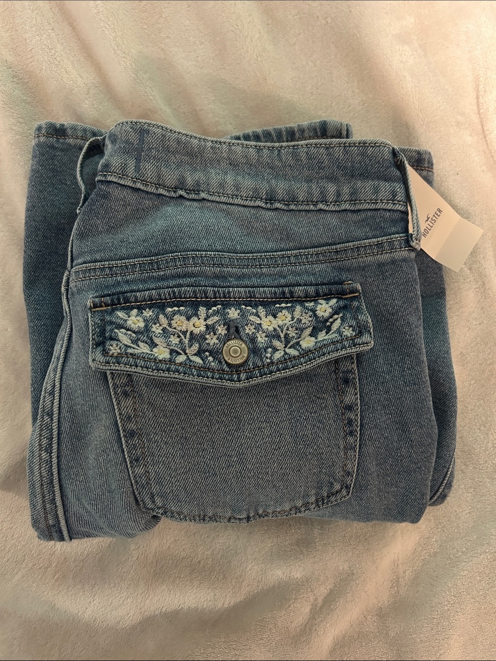 Hollister Low-Rise Flare Light Blue Denim Jeans with Floral Pocket Embroidery